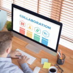 man looking at a computer screen showing chart of collaboration goals